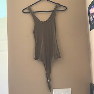Barely worn, soft green bodysuit